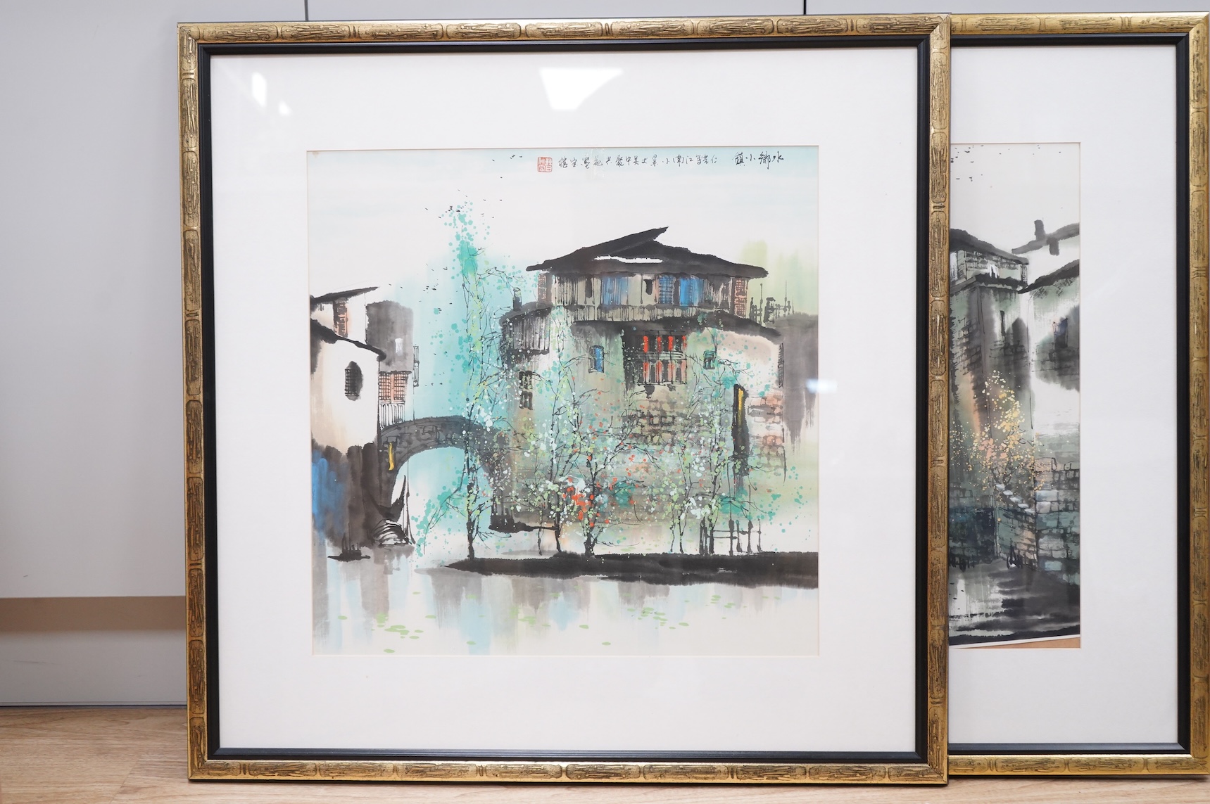 Cao Ren-Rong (Chinese, b.1943), Studies of houses and foliage, each signed with character marks and red seal mark, exhibition leaflet details verso, pair of watercolours, 50 x 50cm